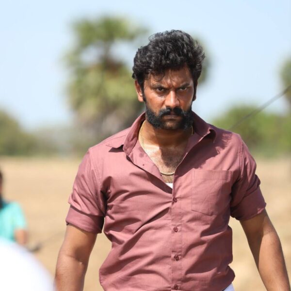 Arulnithi film poster featuring intense expression