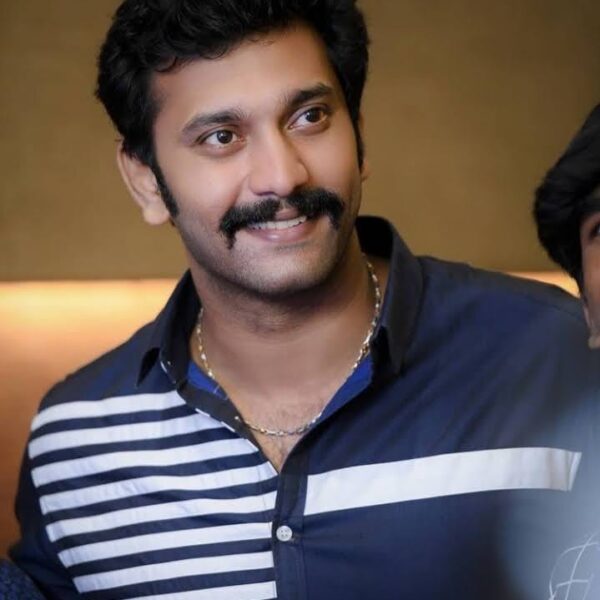 Arulnithi portrait photo in traditional Tamil attire